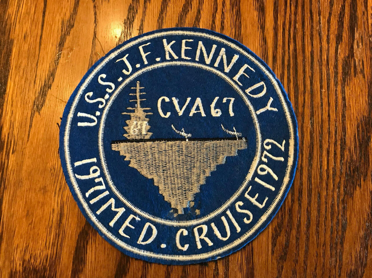 A patch of the uss kennedy in the name of cva 6 7.