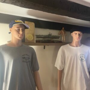 Two young men standing next to each other.